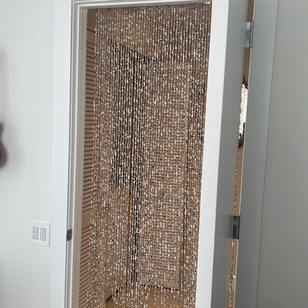 Decorative sea pebbles hanging curtain
